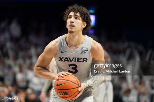Colby Jones of the Xavier Musketeers takes a foul shot during a college basketball game against the Villanova Wildcats at the Cintas Center on...
