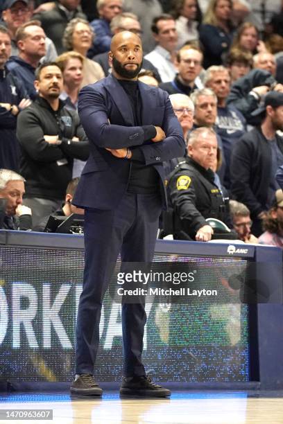 Head coach Kyle Neptune of the Villanova Wildcats looks on during a college basketball game against the Xavier Musketeers at the Cintas Center on...