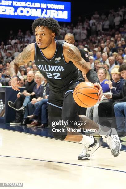 Cam Whitmore of the Villanova Wildcats dribbles the ball during a college basketball game against the Villanova Wildcats at the Cintas Center on...