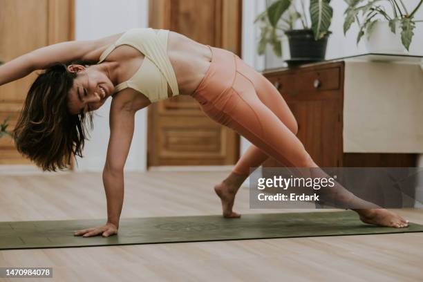 e- learning yoga class at home - hot yoga stock pictures, royalty-free photos & images