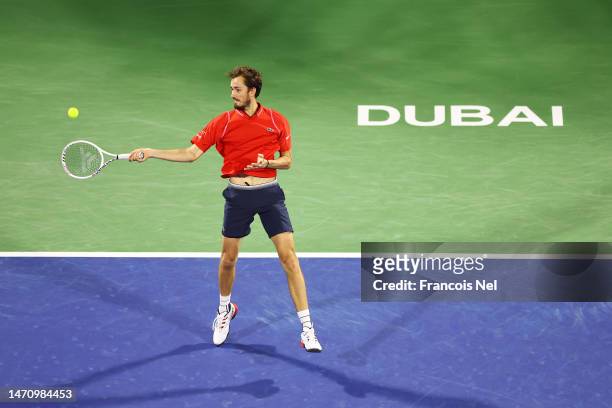 Daniil Medvedev plays a forehand against Novak Djokovic of Serbia in the Men's Singles Semi Final match during day thirteen of the Dubai Duty Free...