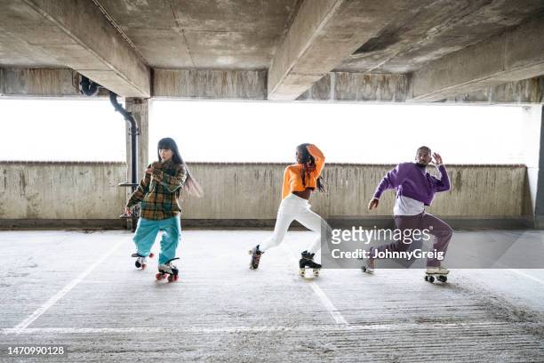 action portrait of freestyle roller skaters - subculture stock pictures, royalty-free photos & images