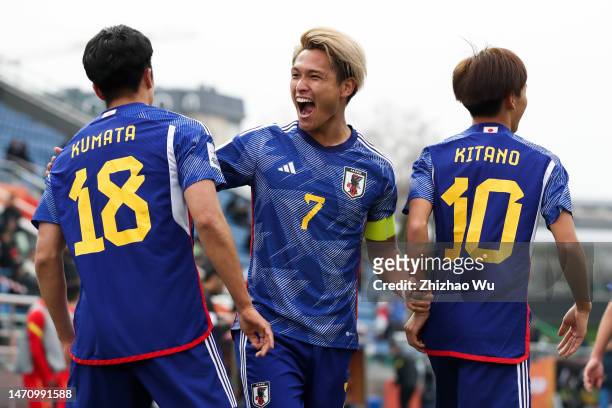 Matsuki Kuryu of Japan celebrates his teammate Kumata Naoki's goal during the match Group D - AFC U20 Asian Cup Uzbekistan between Japan and China at...