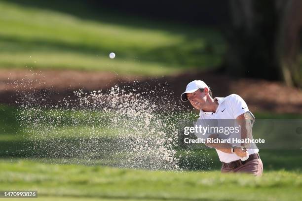 Rory McIlroy of Northern Ireland plays a shot from a greenside bunker on the 15th hole during the second round of the Arnold Palmer Invitational...
