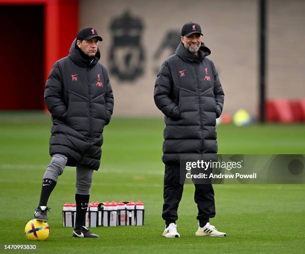 Jurgen Klopp manager of Liverpool Peter Krawietz assistant manager of Liverpool during a training session at AXA Training Centre on March 03, 2023 in...