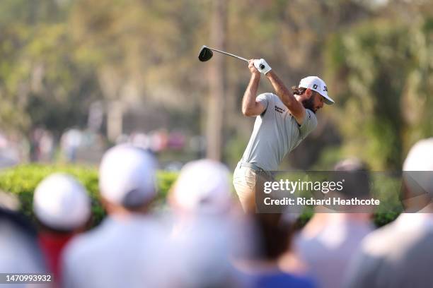 Max Homa of the United States plays his shot from the 15th tee as fans look on during the second round of the Arnold Palmer Invitational presented by...