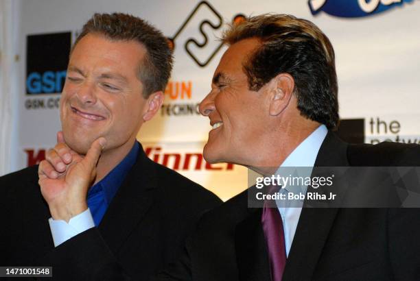 Game-show Host Chuck Woolery having fun with fellow game show host Todd Newton at the Worldwide Web Games Championship, September 9, 2006 in Los...