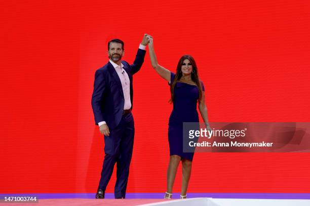 Donald Trump Jr. High fives Kimberly Guilfoyle before speaking at the annual Conservative Political Action Conference at the Gaylord National Resort...