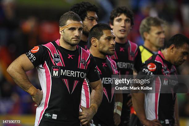 Robbie Farah of the Tigers looks dejected after a Knights try during the round 16 NRL match between the Newcastle Knights and the Wests Tigers at...