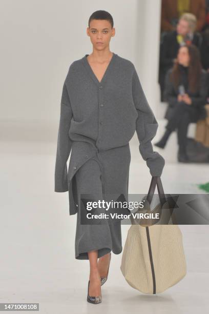 Model walks the runway during the Loewe Ready to Wear Fall/Winter 2023-2024 fashion show as part of the Paris Fashion Week on March 3, 2023 in Paris,...