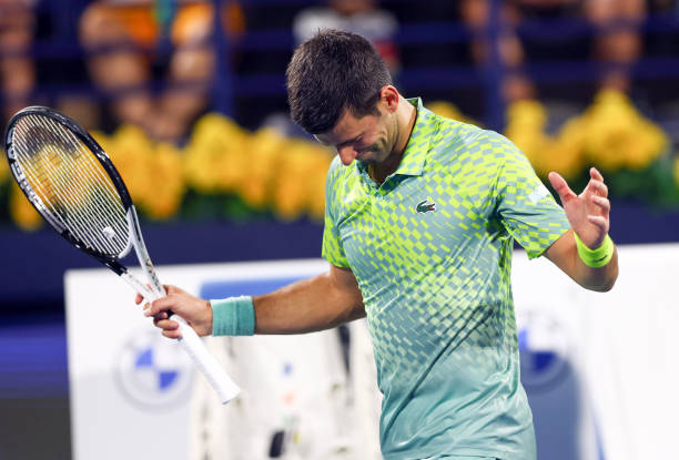 Novak Djokovic of Serbia reacts against Daniil Medvedev during day thirteen of the Dubai Duty Free Tennis at Dubai Duty Free Tennis Stadium on March...