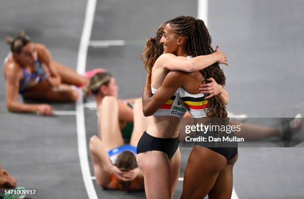 Nafissatou Thiam of Belgium celebrates alongside Noor Vidts of Belgium after winning the Women's Pentathlon with a New World Record during Day 1 of...