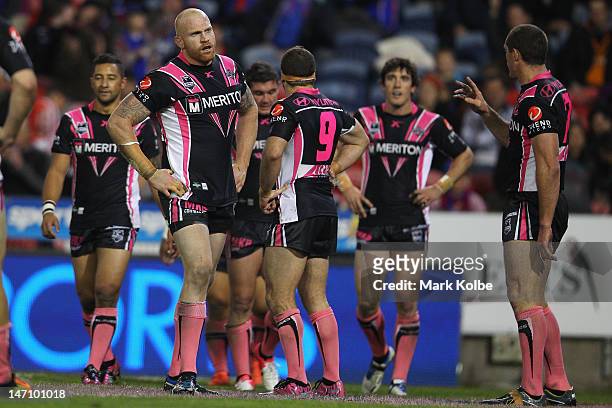 Keith Galloway of the Tigers looks dejected after a Knights try during the round 16 NRL match between the Newcastle Knights and the Wests Tigers at...