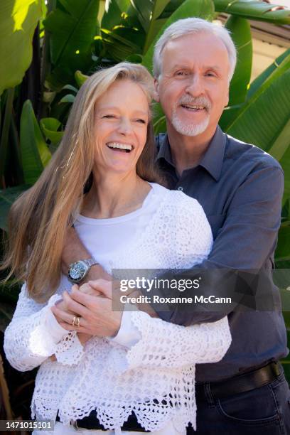 Suzy Amis Cameron and James Cameron pose for a photo during an interview at their home in 2013 in Malibu, California.