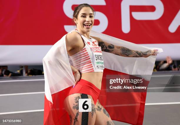 Silver Medallist Ewa Swoboda of Poland pose following the Women's 60m Final during Day 1 of the European Athletics Indoor Championships at the Atakoy...