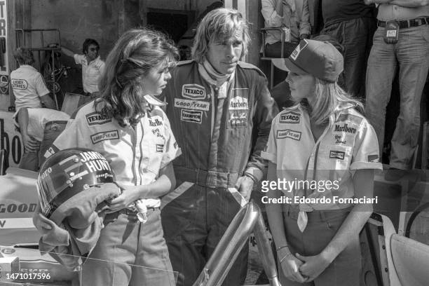 British Formula One driver James Hunt and unidentified others during Italian Grand Prix, Monza, Italy, September 10, 1977.