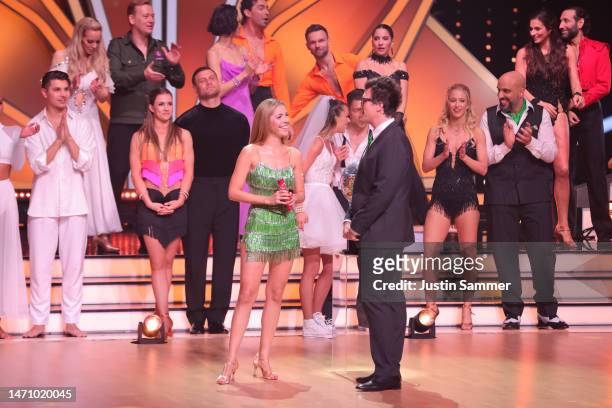 Victoria Swarovski and Daniel Hartwich speak on stage in front of the candidates during the second "Let's Dance" show at MMC Studios on March 03,...
