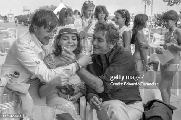 From left, Slovak film director Juraj Jakubisko, Czech actress Eva Jakoubkova, and Slovak actor Stefan Kvietik during the Venice Film Festival,...