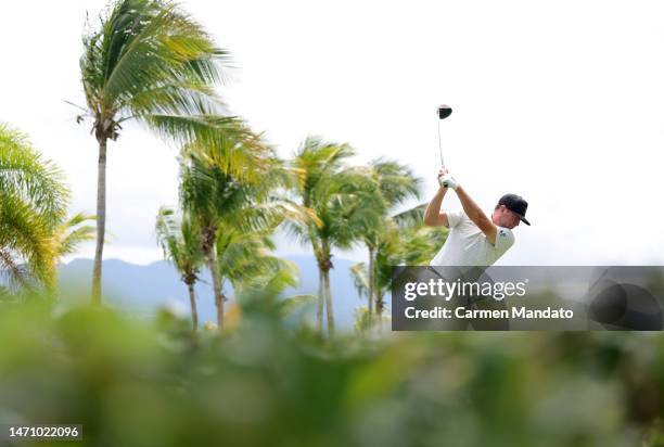 Robert Garrigus of the United States hits his first shot on the 2nd hole during the second round of the Puerto Rico Open at Grand Reserve Golf Club...