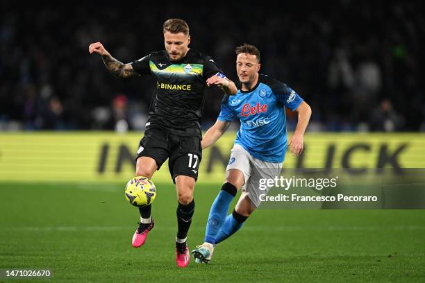 Ciro Immobile of SS Lazio and Amir Rrahmani of SSC Napoli battle for the ball during the Serie A match between SSC Napoli and SS Lazio at Stadio...