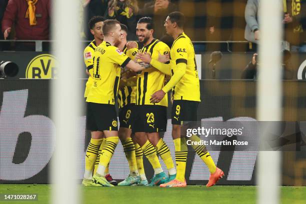 Emre Can of Borussia Dortmund celebrates with teammates after scoring the team's second goal during the Bundesliga match between Borussia Dortmund...