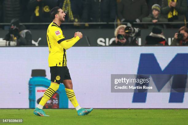 Emre Can of Borussia Dortmund celebrates after scoring the team's second goal during the Bundesliga match between Borussia Dortmund and RB Leipzig at...
