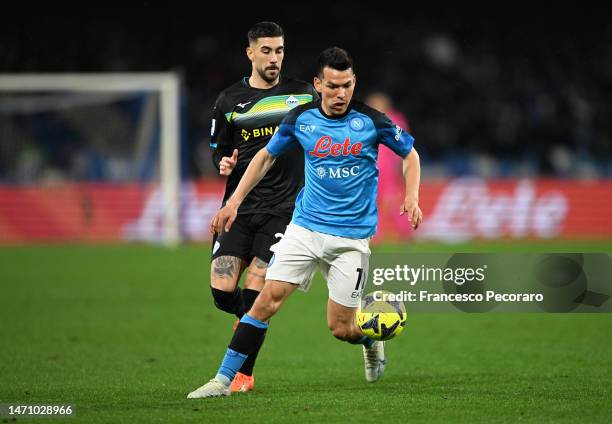 Hirving Lozano of SSC Napoli holds off Mattia Zaccagni of SS Lazio during the Serie A match between SSC Napoli and SS Lazio at Stadio Diego Armando...