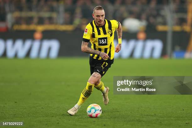 Marius Wolf of Borussia Dortmund runs with the ball during the Bundesliga match between Borussia Dortmund and RB Leipzig at Signal Iduna Park on...