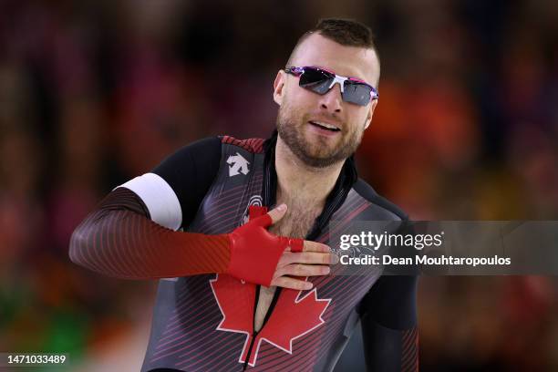 Laurent Dubreuil of Canada celebrates after he competes in the 500m Men race during the ISU World Speed Skating Championships at Thialf Ice Rink on...