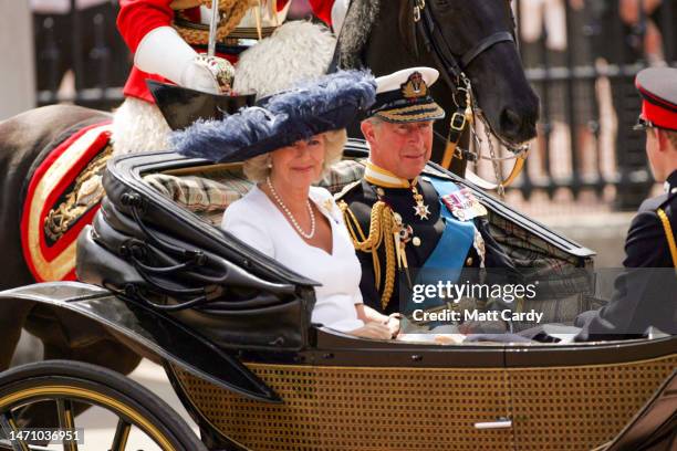 The Prince of Wales and The Duchess Of Cornwall arrive at Buckingham Palace by carriage ahead of a Battle of Britain Memorial Flight fly-past on...