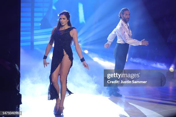 Sally Özcan and Massimo Sinato dance on stage during the second "Let's Dance" show at MMC Studios on March 03, 2023 in Cologne, Germany.