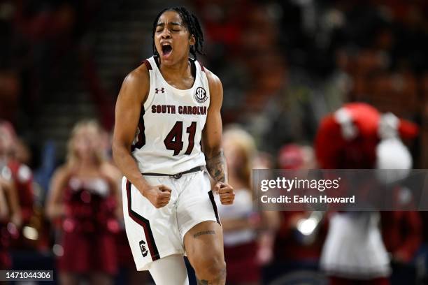 Kierra Fletcher of the South Carolina Gamecocks celebrates a three point basket against the Arkansas Razorbacks in the second quarter during the...