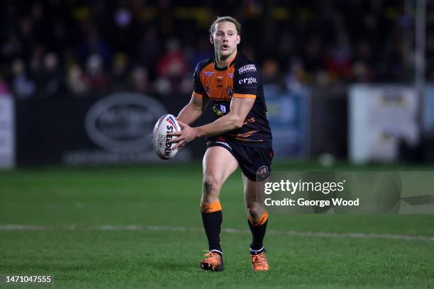 Jacob Miller of Castleford Tigers runs with the ball during the Betfred Super League between Castleford Tigers and Wigan Warriors at Mend-A-Hose...