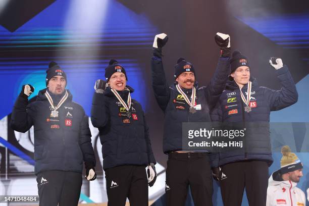 Silver medalists Iivo Niskanen, Niko Anttola, Perttu Hyvarinen and Ristomatti Hakola of Team Finland celebrate during the medal ceremony for the...