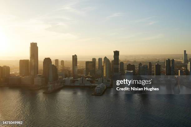 aerial photo of jersey city at sunset - jersey city stock-fotos und bilder