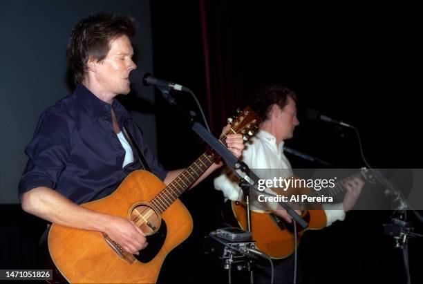 Kevin Bacon and Michael Bacon of The Bacon Brothers perform at the Sheridan Hotel on January 9, 1999 in New York City.