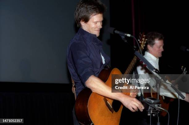 Kevin Bacon and Michael Bacon of The Bacon Brothers perform at the Sheridan Hotel on January 9, 1999 in New York City.