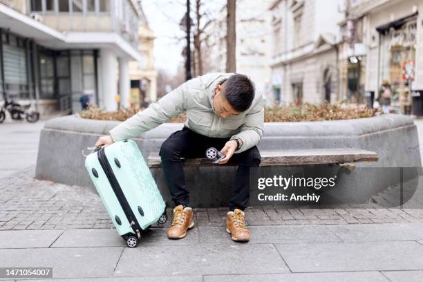 broken suitcase - damaged stock pictures, royalty-free photos & images