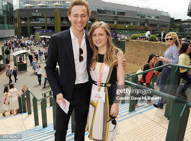 Actor Tom Hiddleston and sister Emma attends the evian 'Live young' VIP Suite at Wimbledon on June 25, 2012 in London, England.