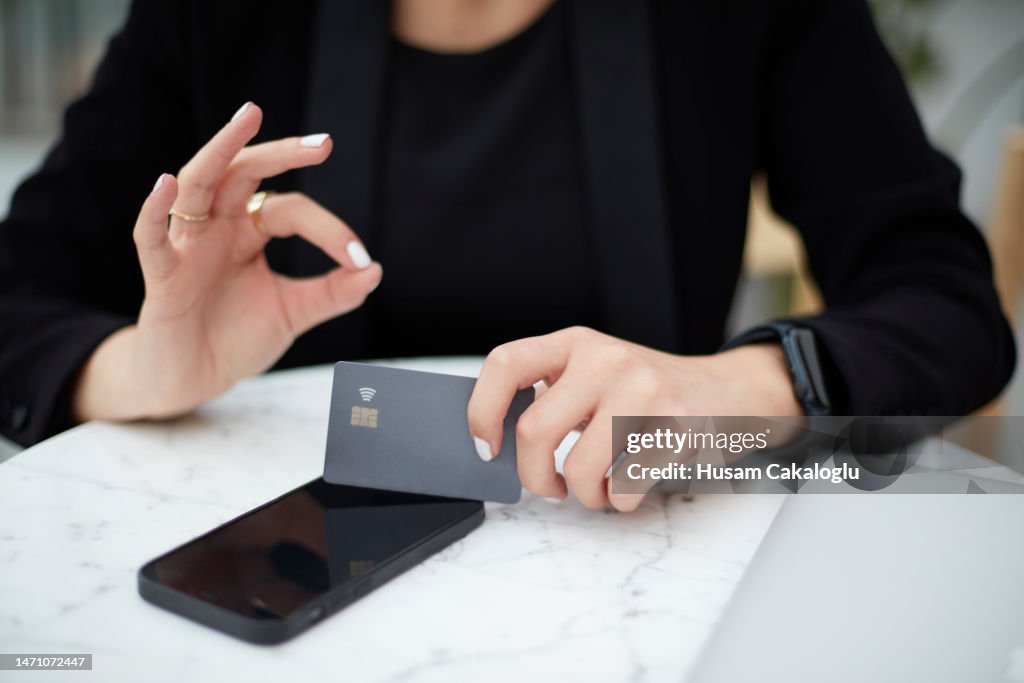 Woman who completed her online shopping by phone over the internet.