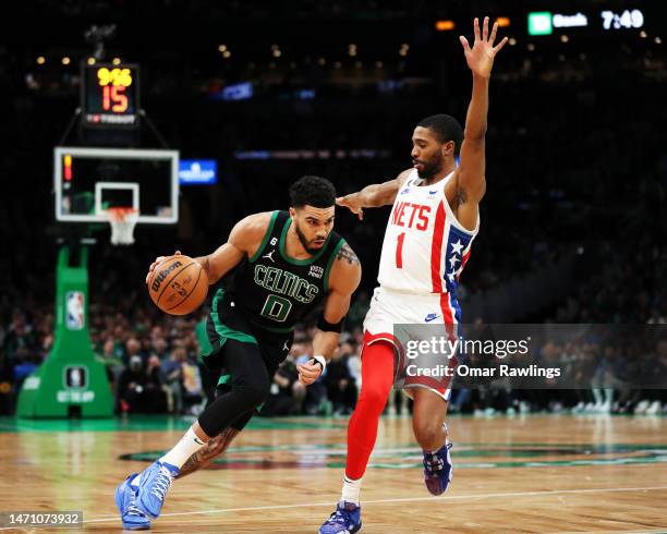 Jayson Tatum of the Boston Celtics drives to the basket during the first quarter of the game against the Brooklyn Nets at TD Garden on March 03, 2023...