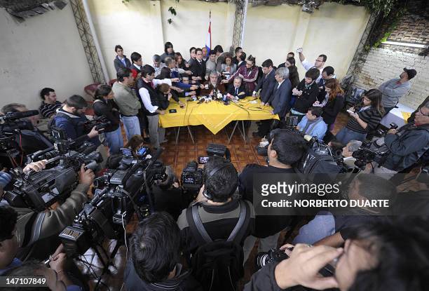 Former Paraguayan President Fernando Lugo talks to journalists in Asuncion on June 25, 2012. Lugo said that he will take part in the Mercosur summit...
