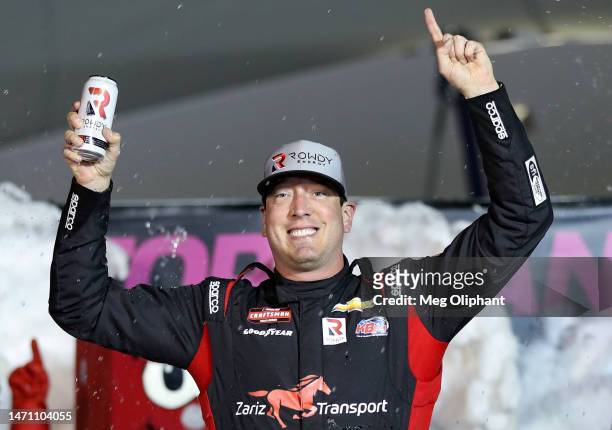 Kyle Busch, driver of the Zariz Transport Chevrolet, celebrates in victory lane after winning for the NASCAR Xfinity Series Alsco Uniforms 300 at Las...