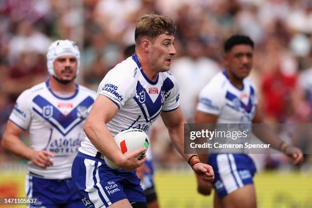 Max King of the Bulldogs runs the ball during the round one NRL match between the Manly Sea Eagles and the Canterbury Bulldogs at 4 Pines Park on...