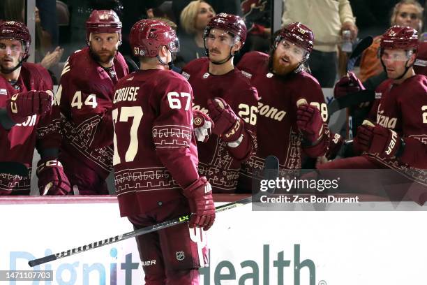 Lawson Crouse of the Arizona Coyotes celebrates with Zack Kassian of the Arizona Coyotes, Laurent Dauphin of the Arizona Coyotes, and Liam O'Brien of...