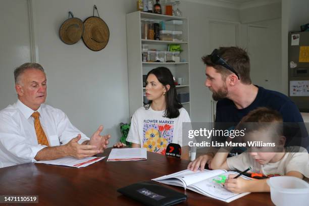 State representative of the One Nation party, Mark Latham meets with Ashleigh Lawrie, Alistair Murray and their son Ace at their home in the suburb...