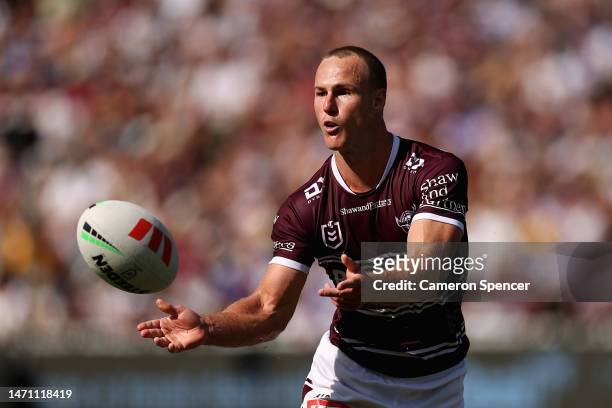 Daly Cherry-Evans of the Sea Eagles passes during the round one NRL match between the Manly Sea Eagles and the Canterbury Bulldogs at 4 Pines Park on...