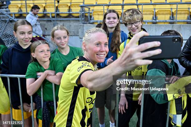 Betsy Hassett of the Phoenix takes a photo with fans after the during the round 16 A-League Women's match between Wellington Phoenix and Brisbane...