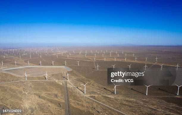 Wind turbines operate at the Gobi Desert on March 3, 2023 in Yumen, Gansu Province of China.
