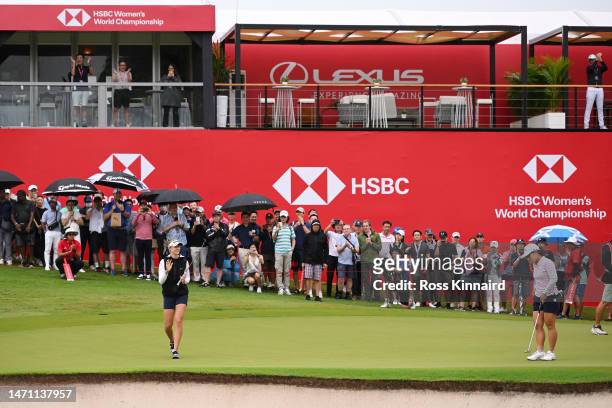 Nelly Korda of The United States celebrates a birdie putt on the eighteenth green during Day Three of the HSBC Women's World Championship at Sentosa...